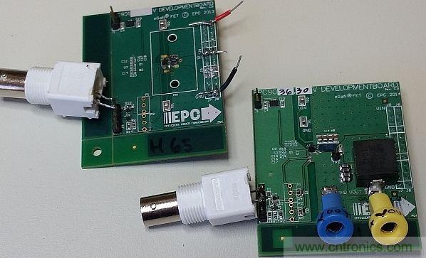 圖1：這里僅在左側(cè)的電路板上配備了半橋配置，右側(cè)的電路板配備了完整的DC-DC轉(zhuǎn)換器。香蕉插座可將測試板連接至電子負載。通過BNC連接器可連接至外部脈沖發(fā)生器。